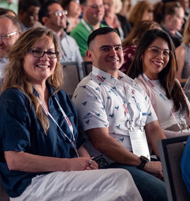 IMA members seated at a conference session