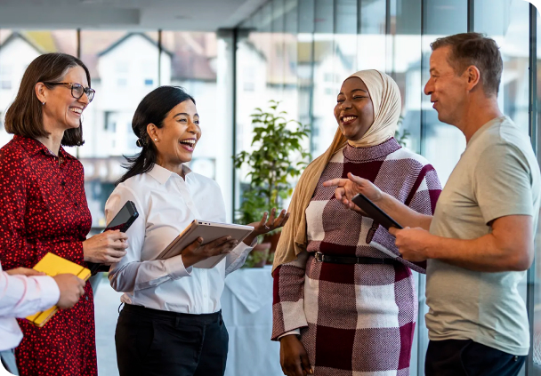 a group of diverse coworkers chatting